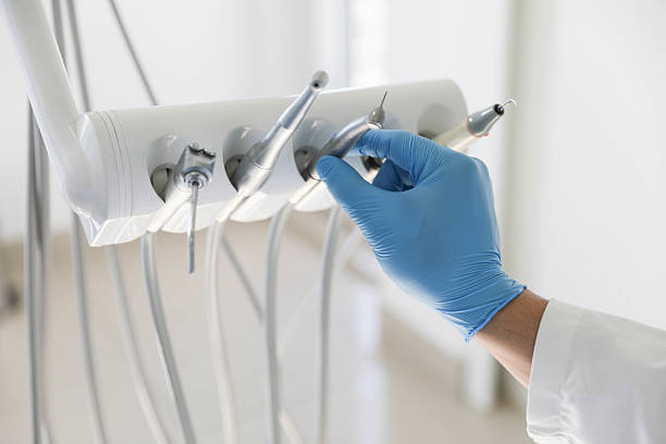 Professional Dental Implants technician working in Great Neck Estates, NY